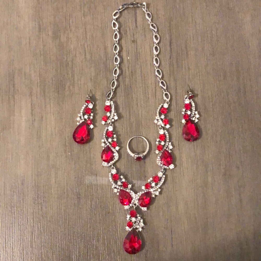 Beautiful silver, ruby and crystal necklace, earrings and ring set.